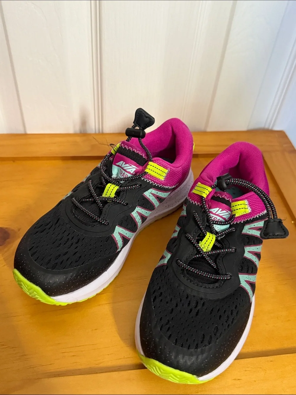 Two pairs of girls size 2 shoes—new Avia sneakers and Cat & Jack used once boots
